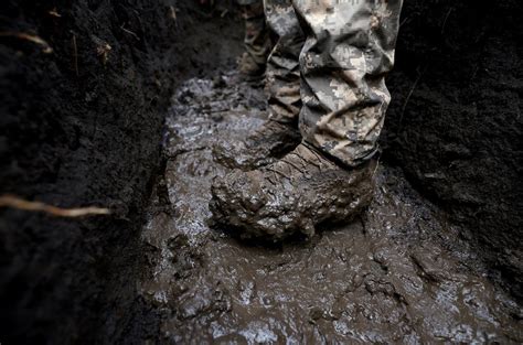 cleaning mud Ukraine|mud in ukraine today.